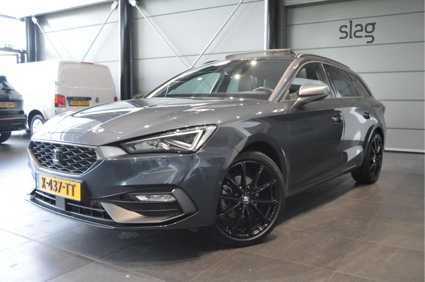 SEAT Leon Sportstourer - 1.0 eTSI FR navi pano leer camera cruise 18 inch !! - AutoWereld.nl
