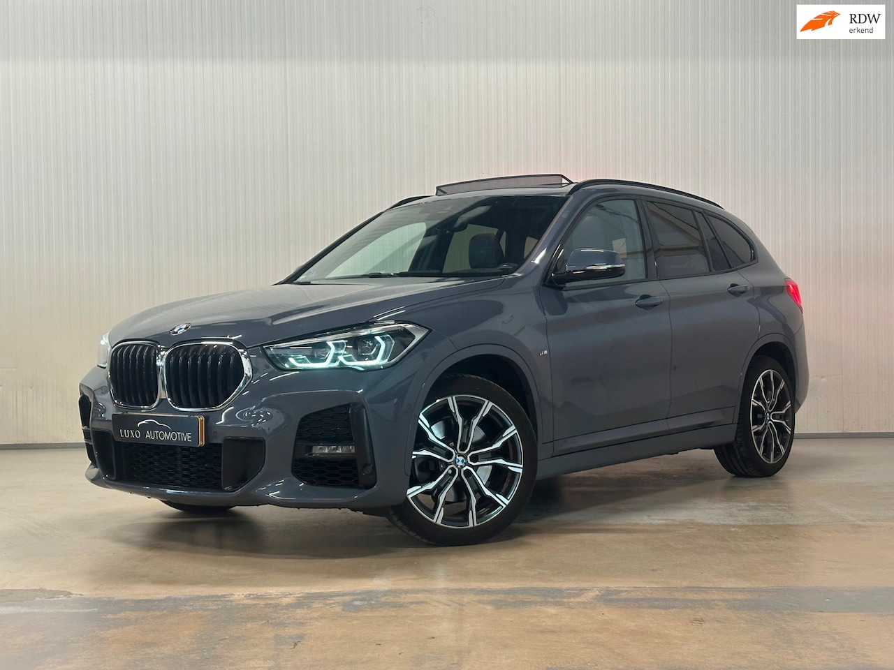 BMW X1 - XDrive20i High Executive | M-SPORT | PANO | TREKHAAK | HARMAN KARDON - AutoWereld.nl