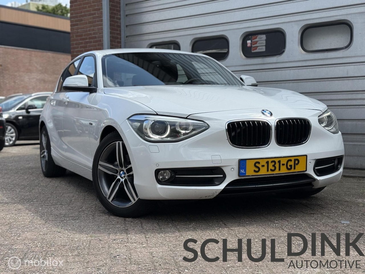 BMW 1-serie - 116i Sport CRUISE CONTROLE|AIRCO|SPORTSTOELEN - AutoWereld.nl