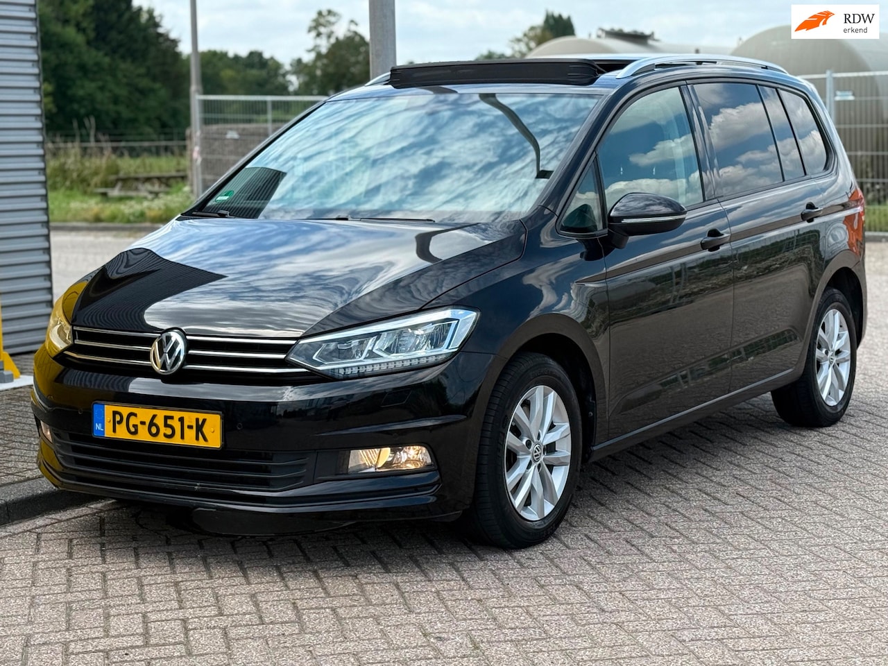 Volkswagen Touran - 2.0 TDI Highline 7Persoons Panoramadak Xenon Navi Pdc - AutoWereld.nl