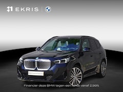 BMW iX1 - eDrive20 M Sportpakket | Premium Pack | Trekhaak met elektrisch wegklapbare kogel | Glazen