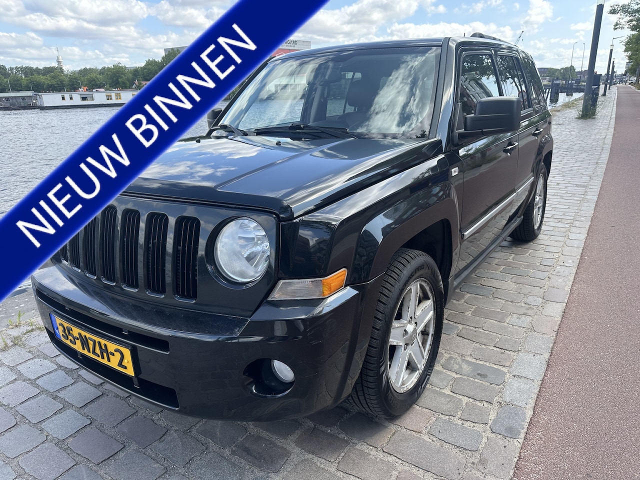 Jeep Patriot - 2.4 Limited Liberty automaat airco/ecc apk 2-2027 - AutoWereld.nl