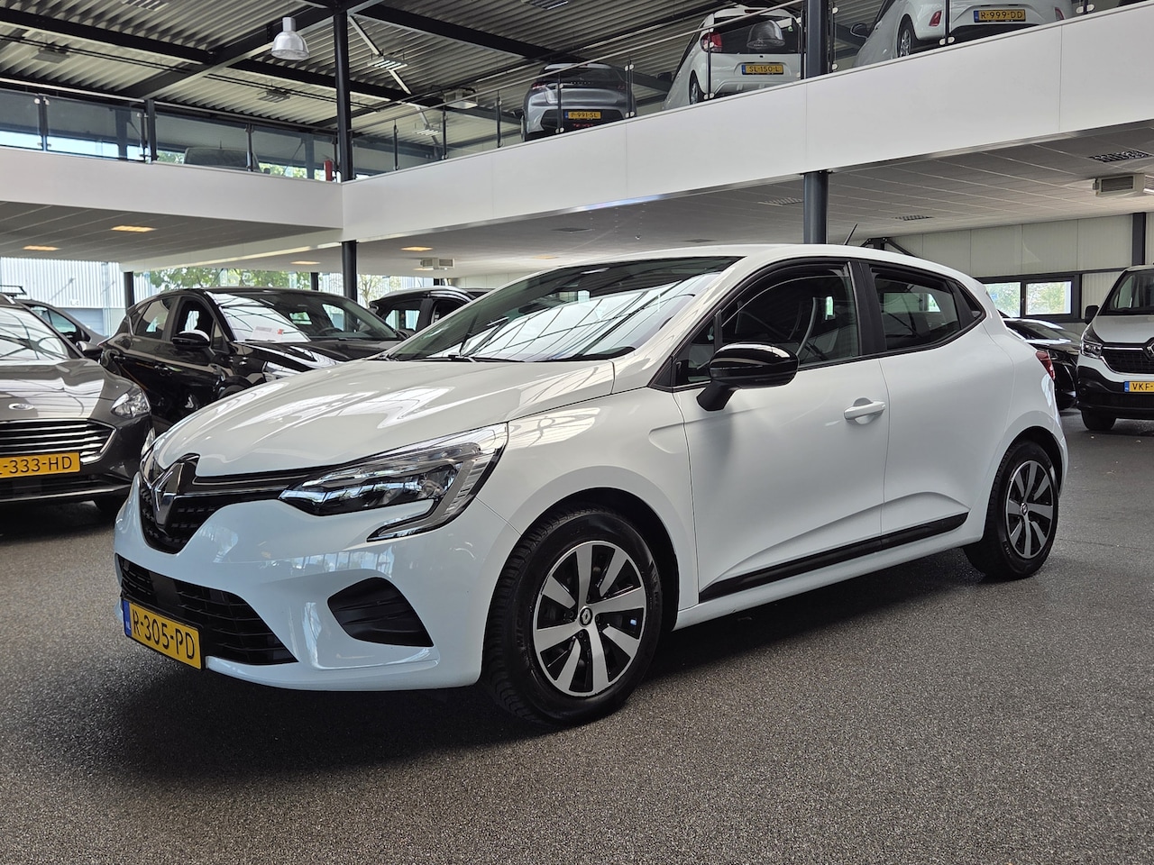 Renault Clio - 1.6 E-Tech Hybrid 145 Equilibre Carplay, Cuise, Airco, Led, Etc. - AutoWereld.nl