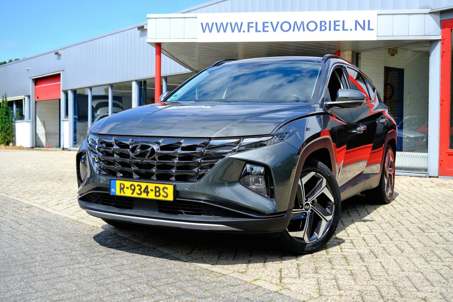 Hyundai Tucson - 1.6 T-GDI PHEV Premium Sky 4WD Aut. Pano|1e Eig|Leder|Nav|Cam|LMV - AutoWereld.nl