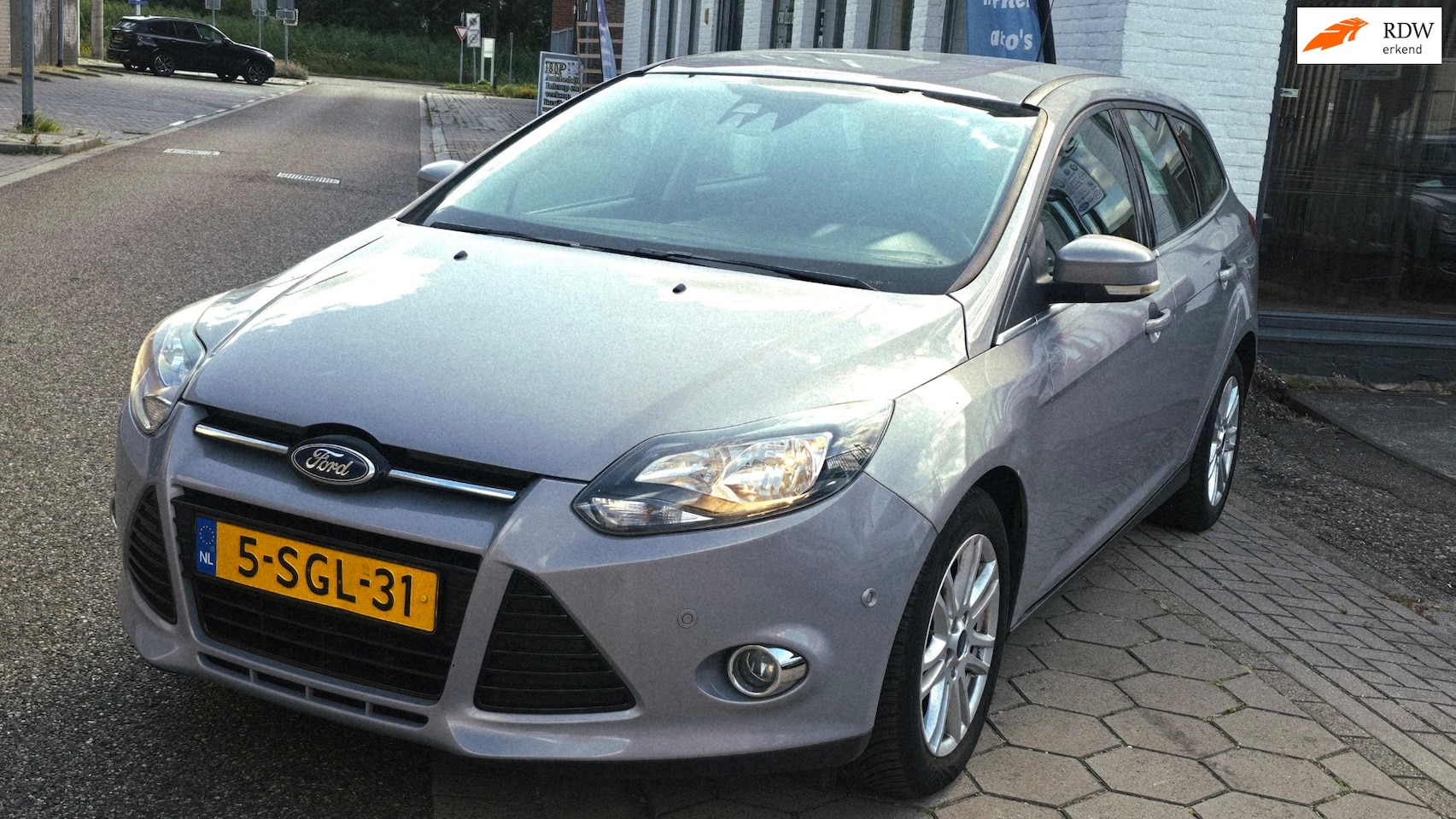 Ford Focus Wagon - 1.0 EcoBoost Titanium*3e eig*nap*apk*dealer onderhoud*airco ijs*inruil mog!!! - AutoWereld.nl