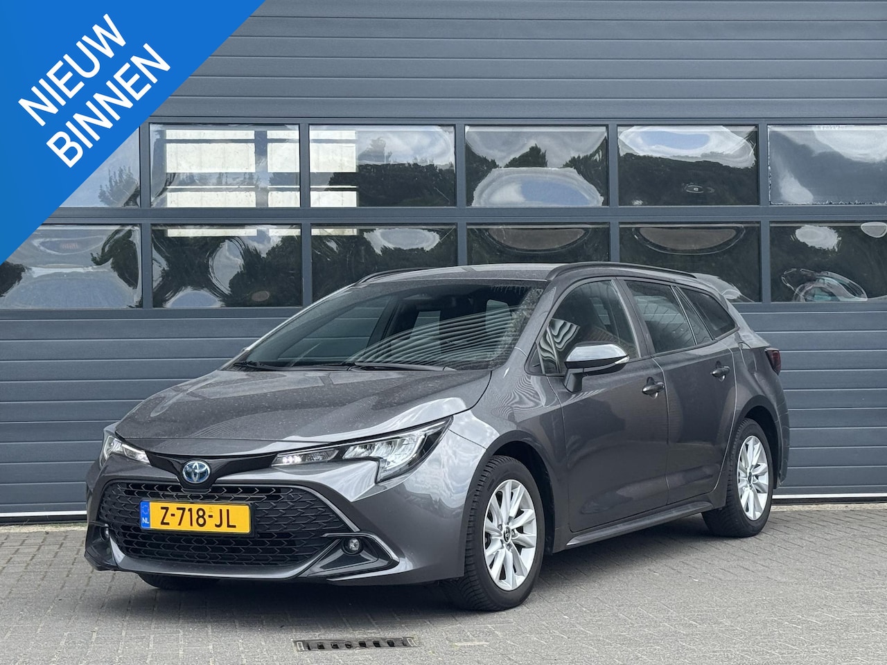 Toyota Corolla Touring Sports - HYBRID 140 ACTIVE I P-CAMERA I APPLE CARPLAY I ANDROID AUTO I NAVIGATIE I CLIMATE CONTROL - AutoWereld.nl