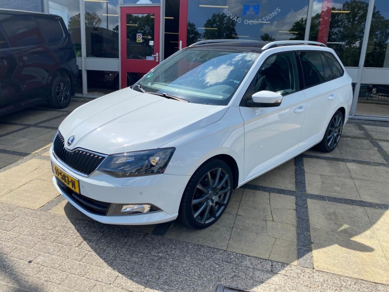 Skoda Fabia Combi - 1.2 TSI STYLE BNSL. panorama dak / clima - AutoWereld.nl