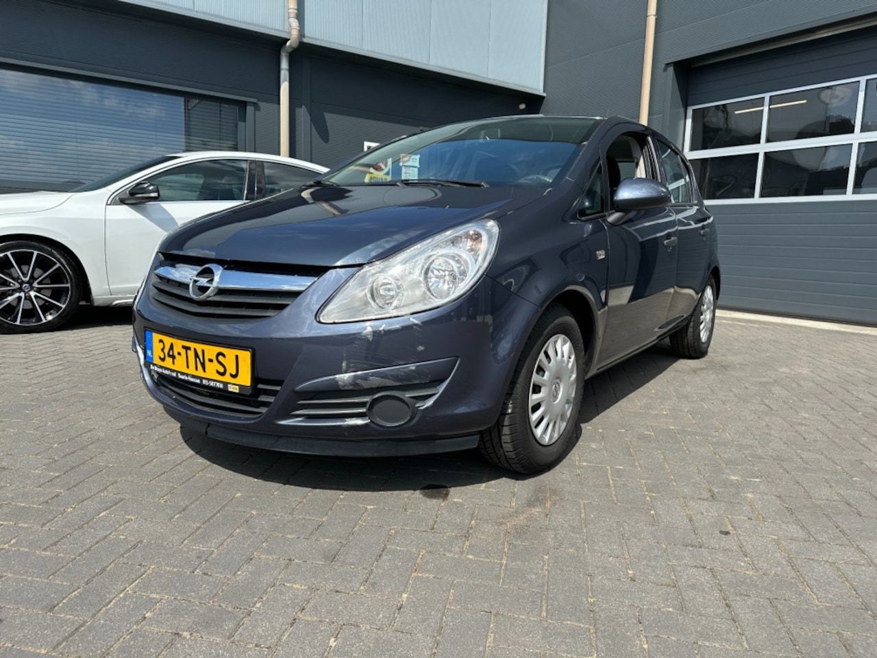 Opel Corsa - 1.0-12V Essentia 5drs. APK juli-2027 - AutoWereld.nl