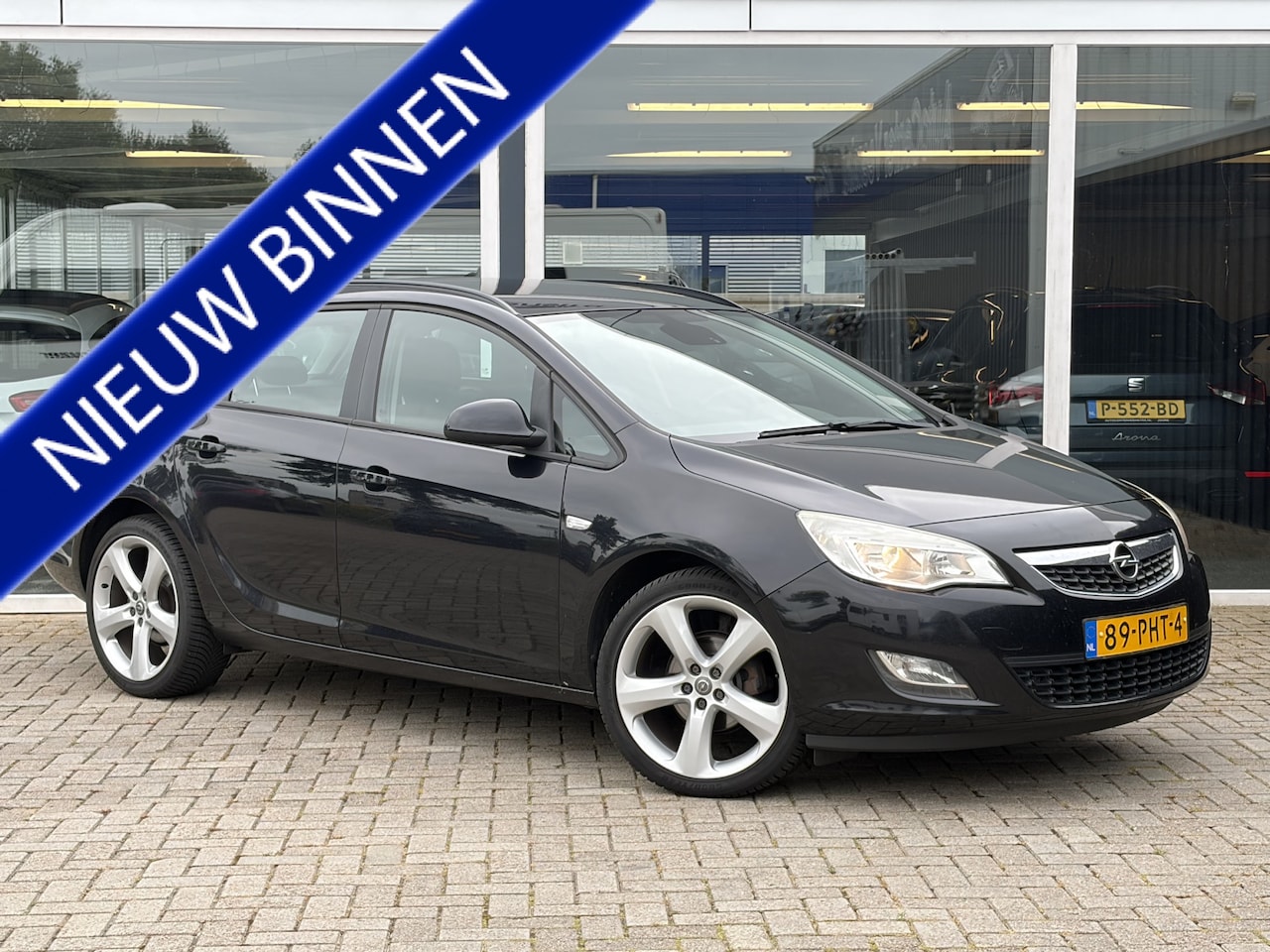 Opel Astra Sports Tourer - 1.4 Turbo Edition 141 PK / Airco / Cruise / LMV - AutoWereld.nl