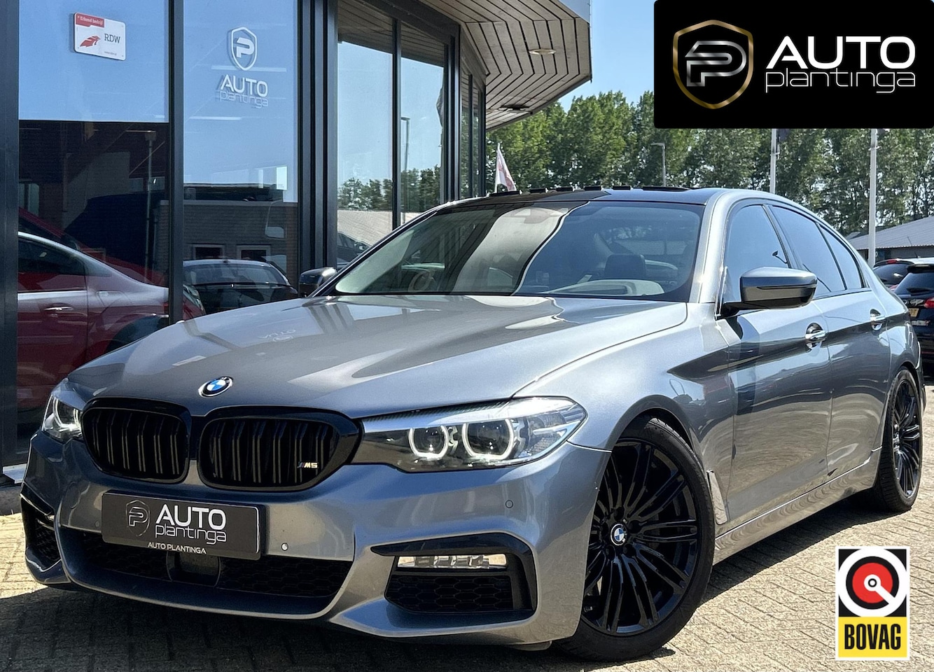 BMW 5-serie - 530d High Executive 265PK | AUTOMAAT | PANO | Achteruitrijcamera | Leder | Memory | Head U - AutoWereld.nl