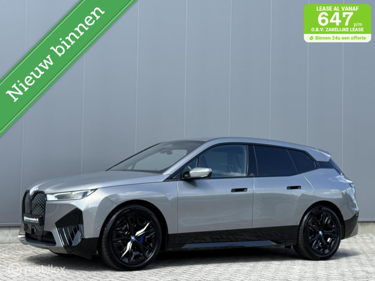 BMW iX - xDrive40 77 kWh | Trekhaak | Harman Kardon | SOH 96% - AutoWereld.nl
