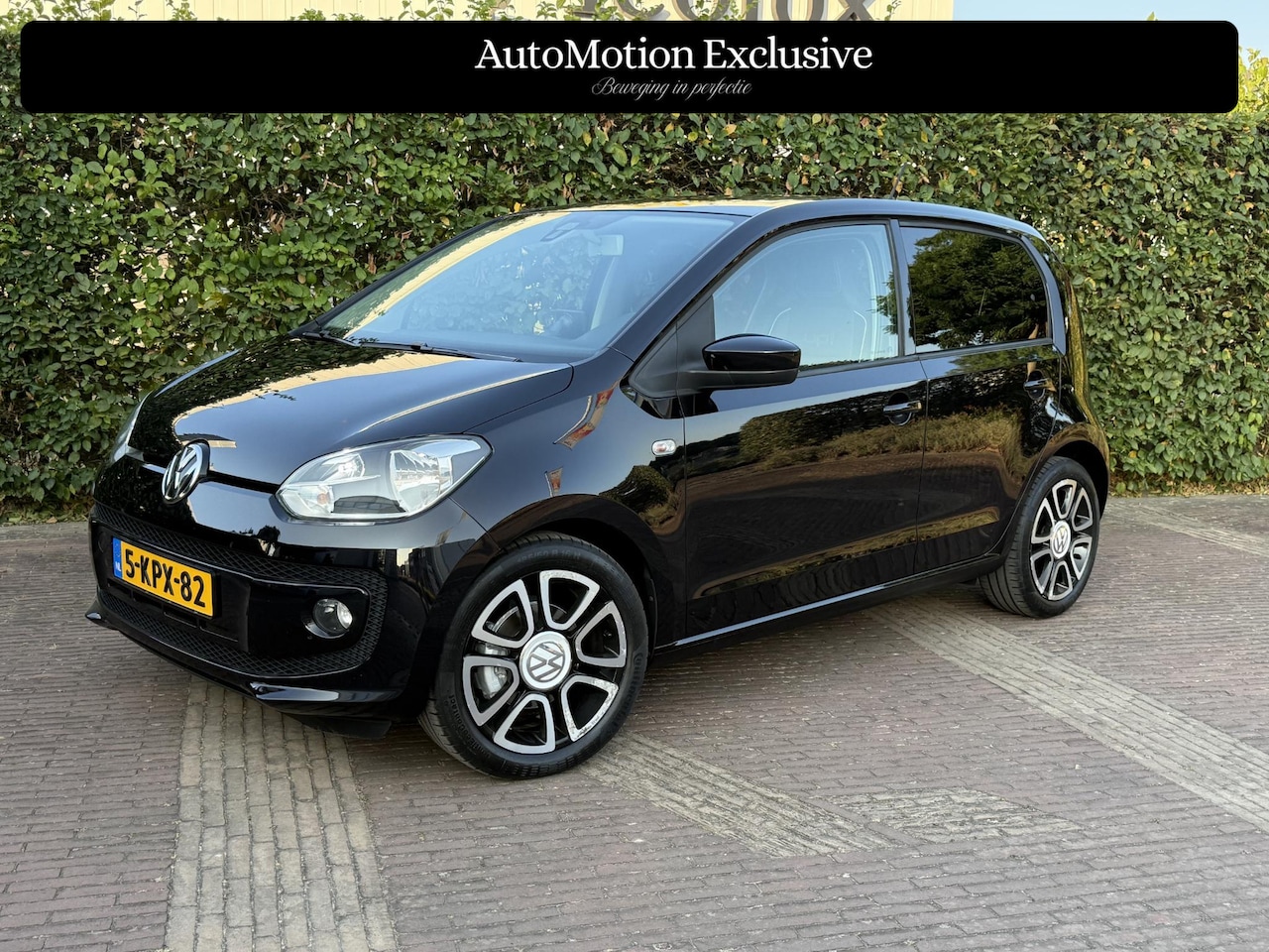 Volkswagen Up! - 1.0 High Up! Pano|PDC|Cruise|Leder|Stoelverwarming|Navi|NAP - AutoWereld.nl