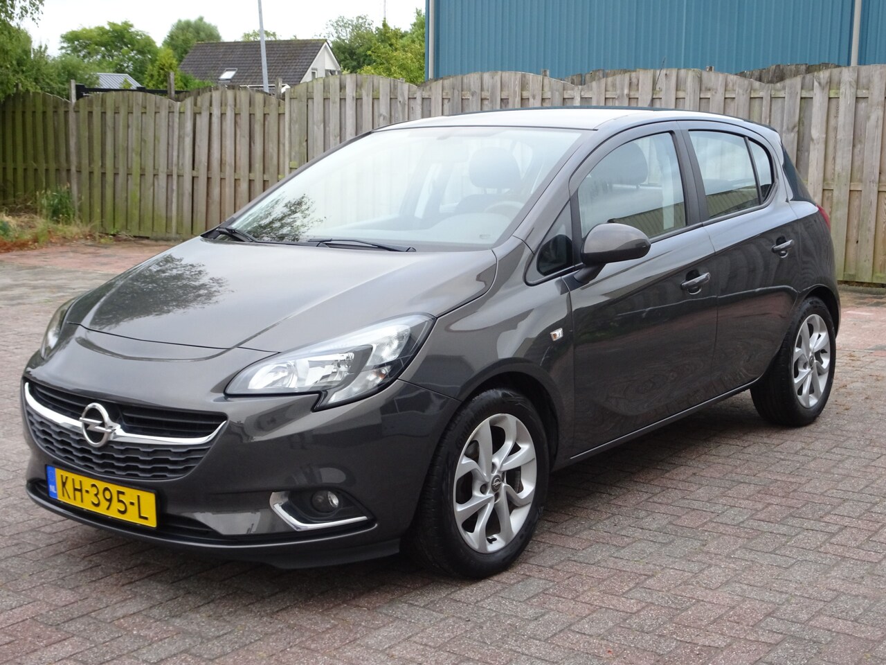Opel Corsa - 1.4 Edition Airco, cruise controle, licht metalen velgen, trekhaak, mistlampen voor, enz. - AutoWereld.nl