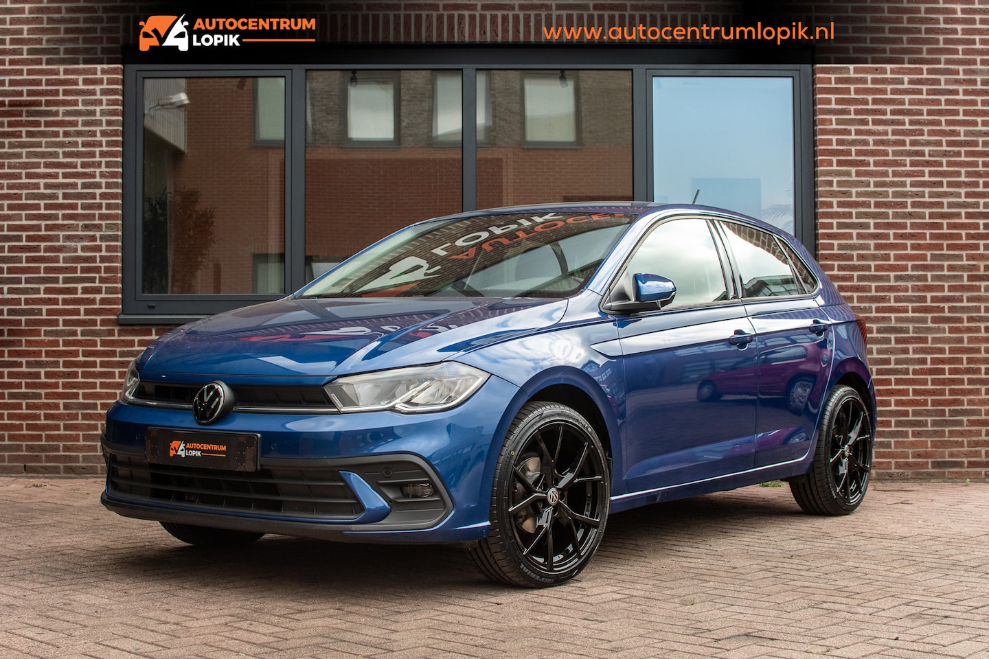 Volkswagen Polo - 1.0 TSI Style Stoelverwarming|Navi|Apple Carplay|Park pilot - AutoWereld.nl