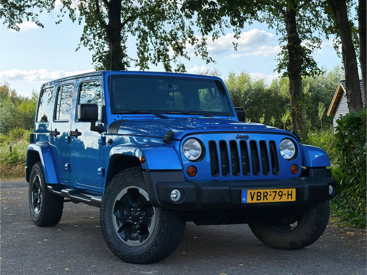 Jeep Wrangler Unlimited - 2.8 CRD - Polar Edition - ZEER NETJES - VAN - AutoWereld.nl