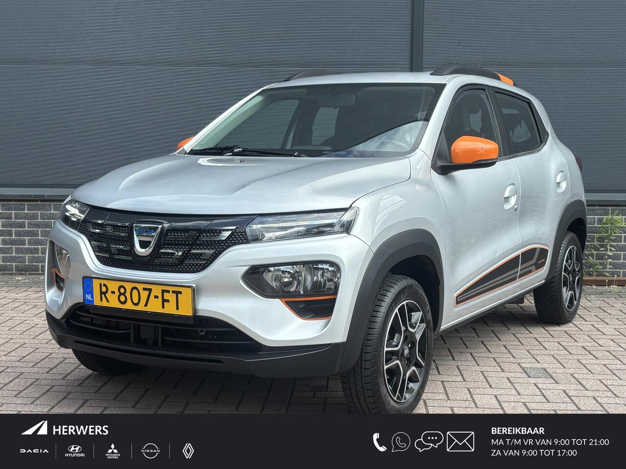 Dacia Spring - Comfort Plus 27 kWh / 1e Eigenaar / Dealer Onderhouden / NL Auto / 92% SOH /Navigatie / Ai - AutoWereld.nl