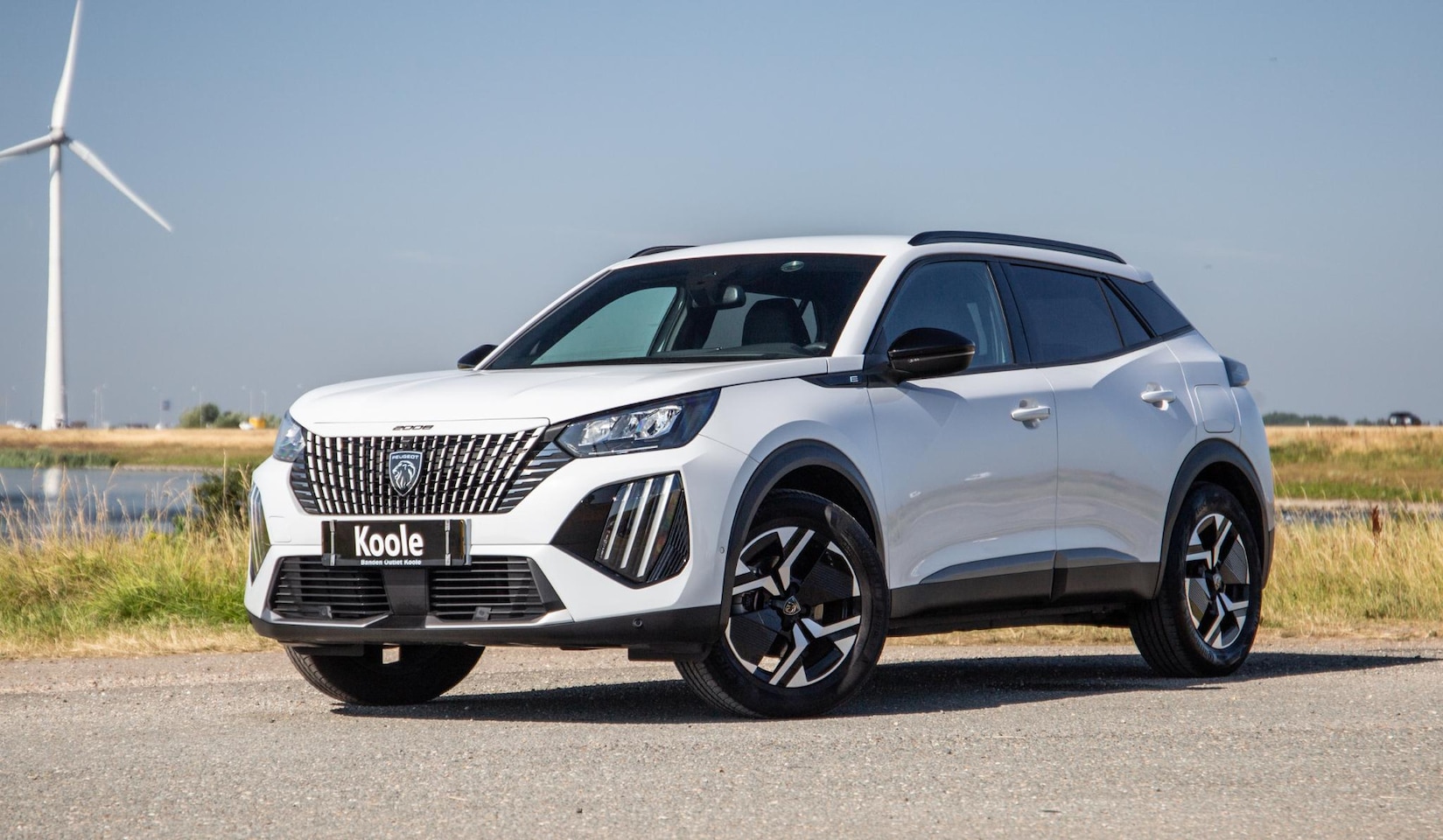 Peugeot e-2008 - EV Allure 54 kWh ADAPTIVE CRUISE / CARPLAY / CAMERA / NAVI - AutoWereld.nl