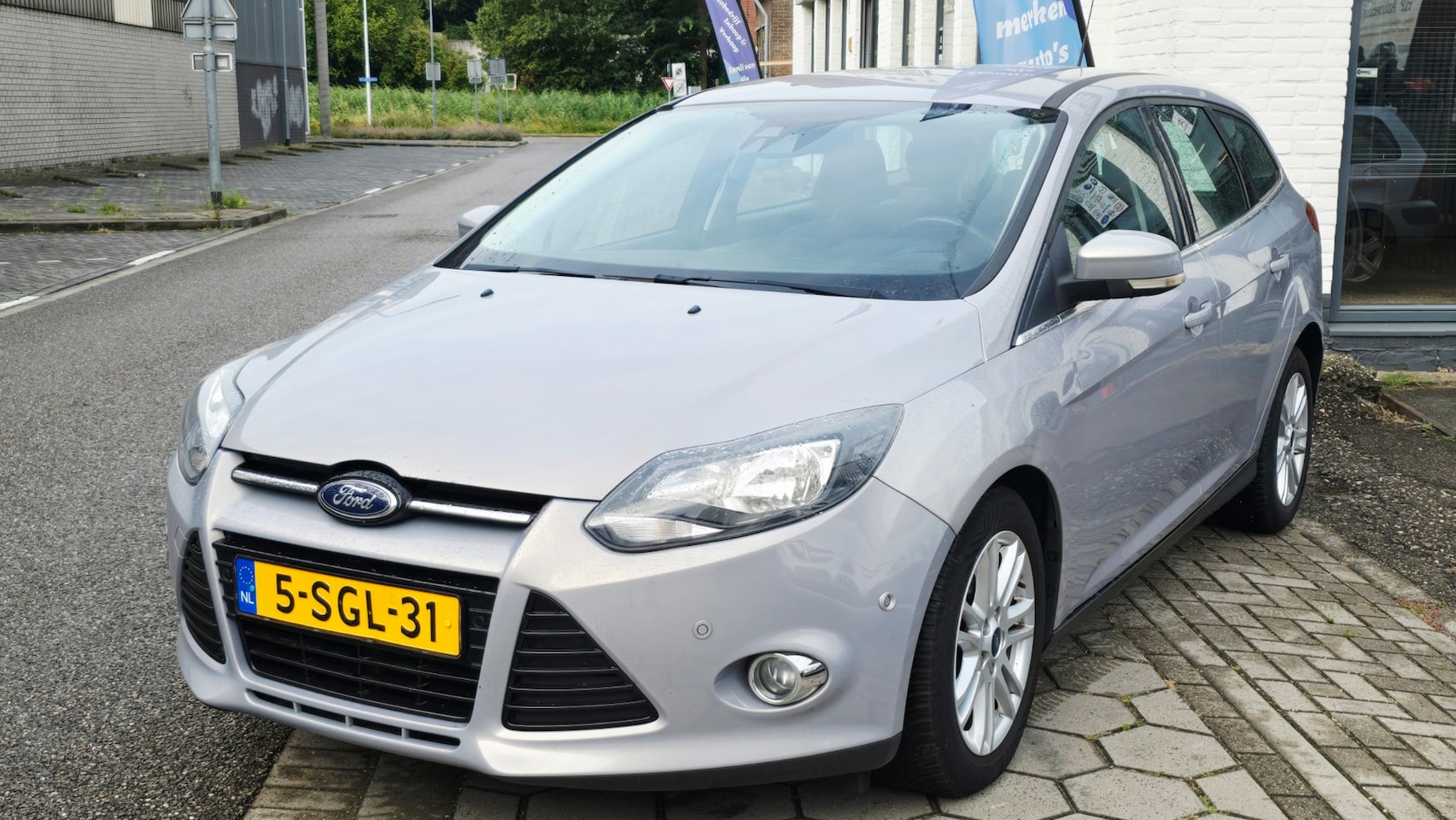 Ford Focus Wagon - 1.0 EcoBoost Titanium*3e eig*nap*apk*dealer onderhoud*airco ijs*inruil mog!!! - AutoWereld.nl