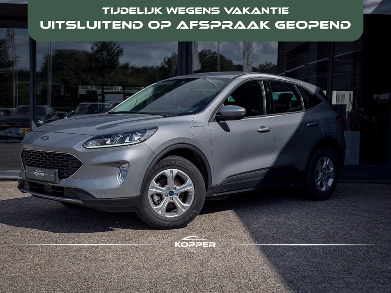 Ford Kuga - 2.5 PHEV Cool & Connect / Winterpack / Trekhaak / All-season / Alarm / Zilver Metallic / I - AutoWereld.nl