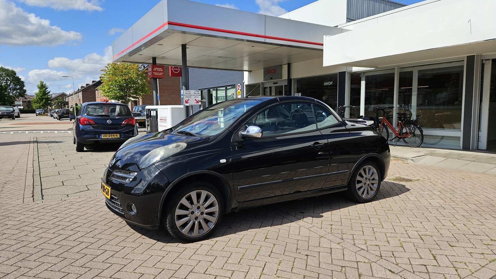 Nissan Micra - 1.6 AUT Tekna - AutoWereld.nl