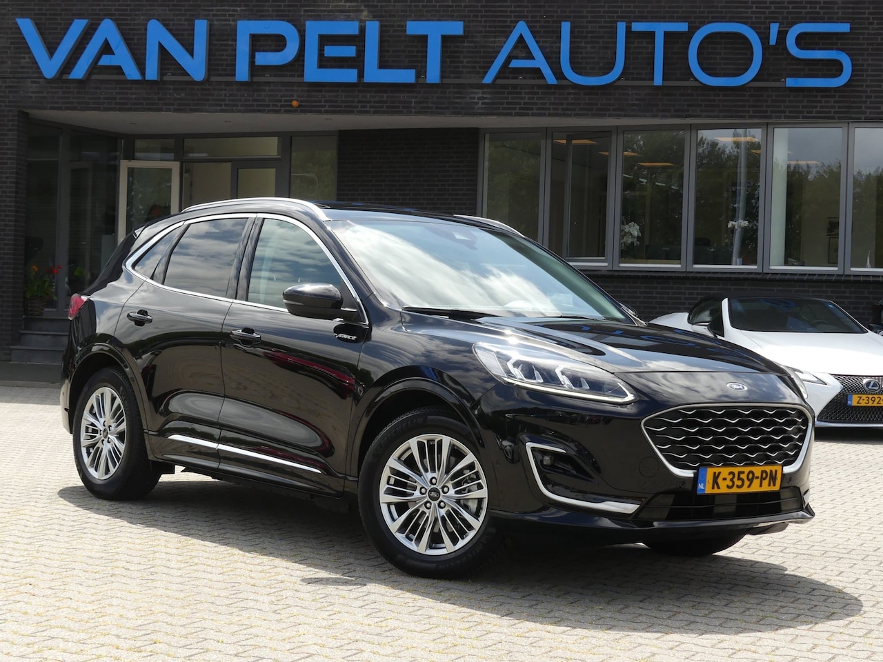 Ford Kuga - 2.5 PHEV Vignale / Pano / H&K Audio / Winter - AutoWereld.nl