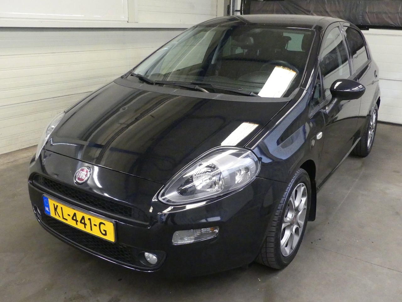 Fiat Punto Evo - 0.9 TwinAir Lounge - Airco - Weinig Km Nap - AutoWereld.nl