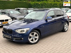 BMW 1-serie - 114i EDE Corporate Lease Edition|Distributie ketting verv.|Groot Navi|Xenon|Climate contro