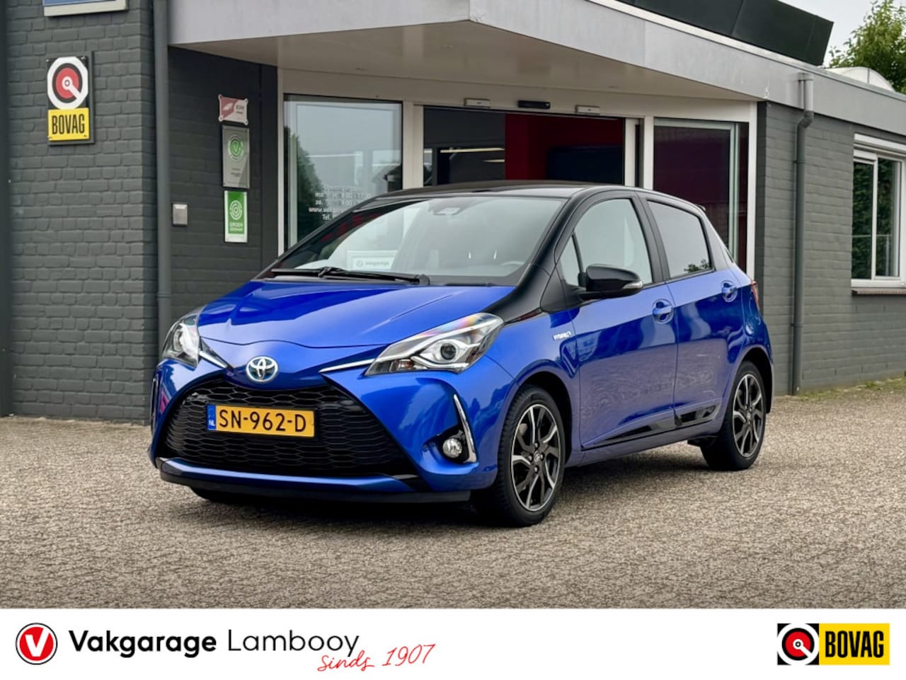 Toyota Yaris - 1.5 Hybrid Bi-Tone Navi Camera Cruise NL auto - AutoWereld.nl