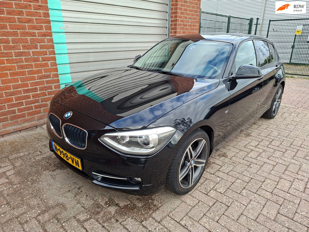 BMW 1-serie - 116i High Executive Clima NAP - AutoWereld.nl