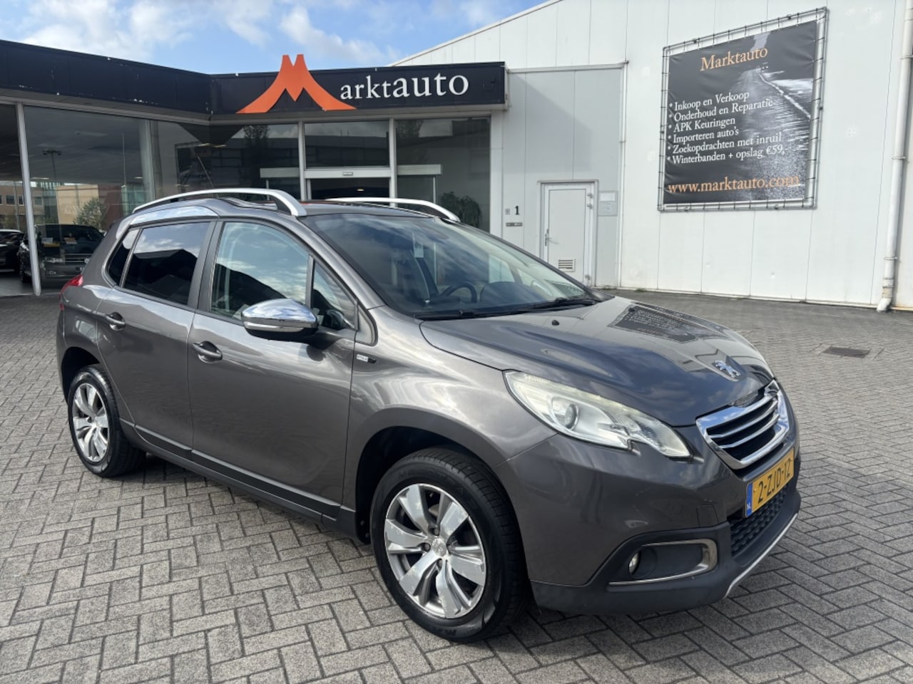 Peugeot 2008 - 1.2 PureTech Style Navi Climate Panorama - AutoWereld.nl