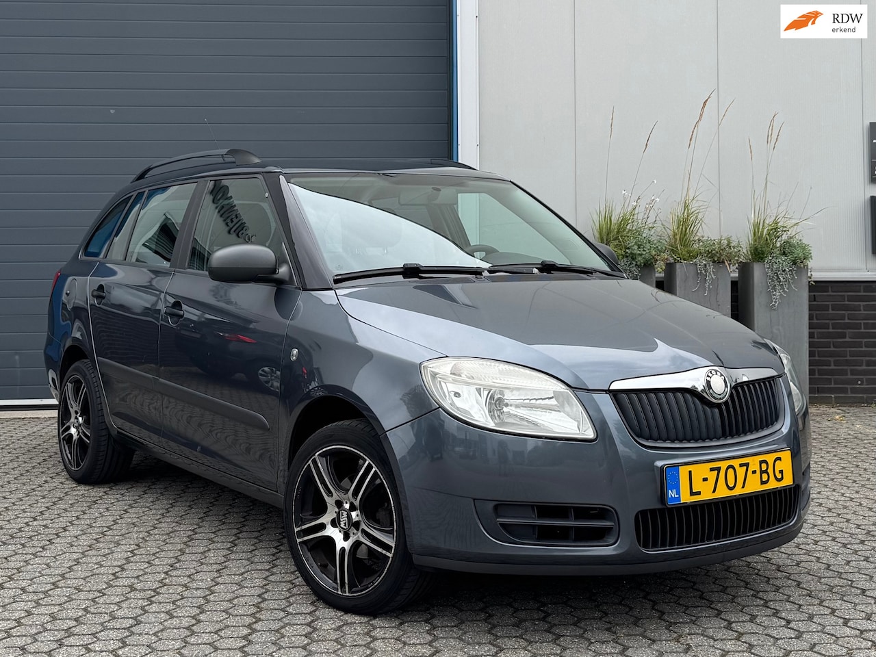 Skoda Fabia Combi - 1.4-16V Tour | Climate | Airco | Bluetooth - AutoWereld.nl
