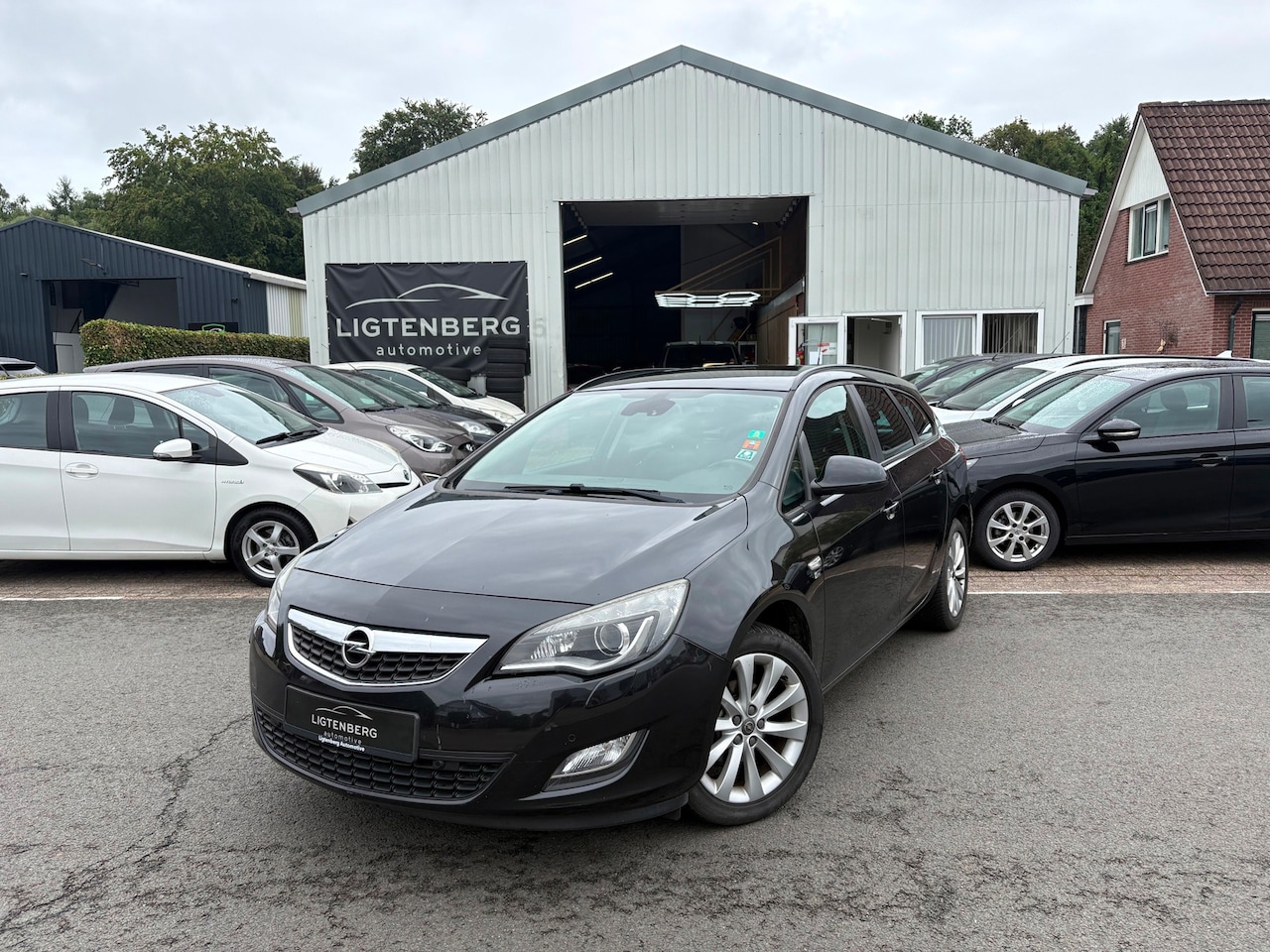 Opel Astra Sports Tourer - 1.4 Turbo Sport CRUISE/STOELVERW - AutoWereld.nl