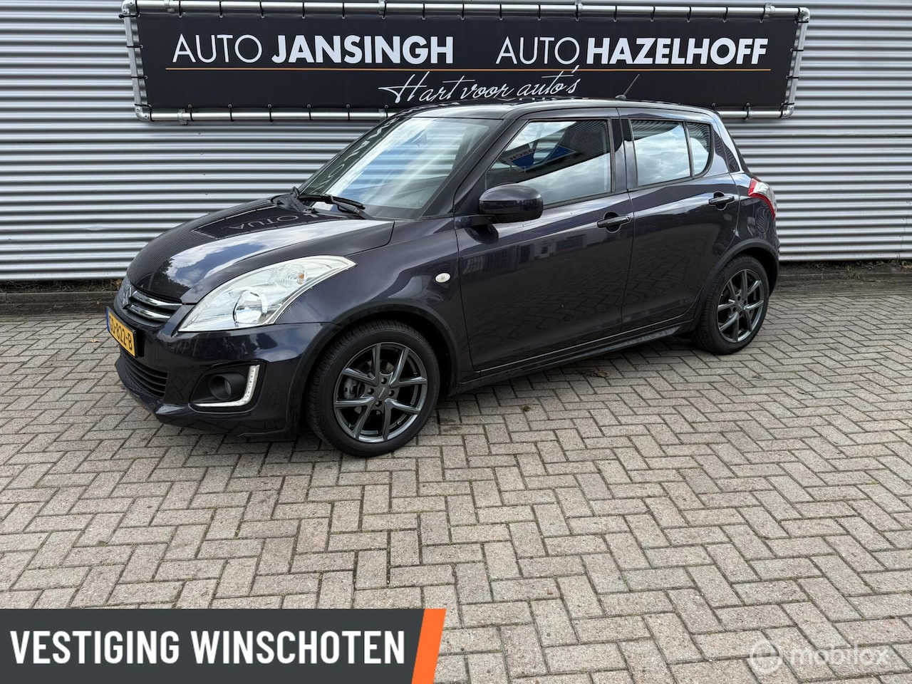 Suzuki Swift - 1.2 Style EASSS | Cruise | Airco | Navi | PDC Achter | Bluetooth | - AutoWereld.nl