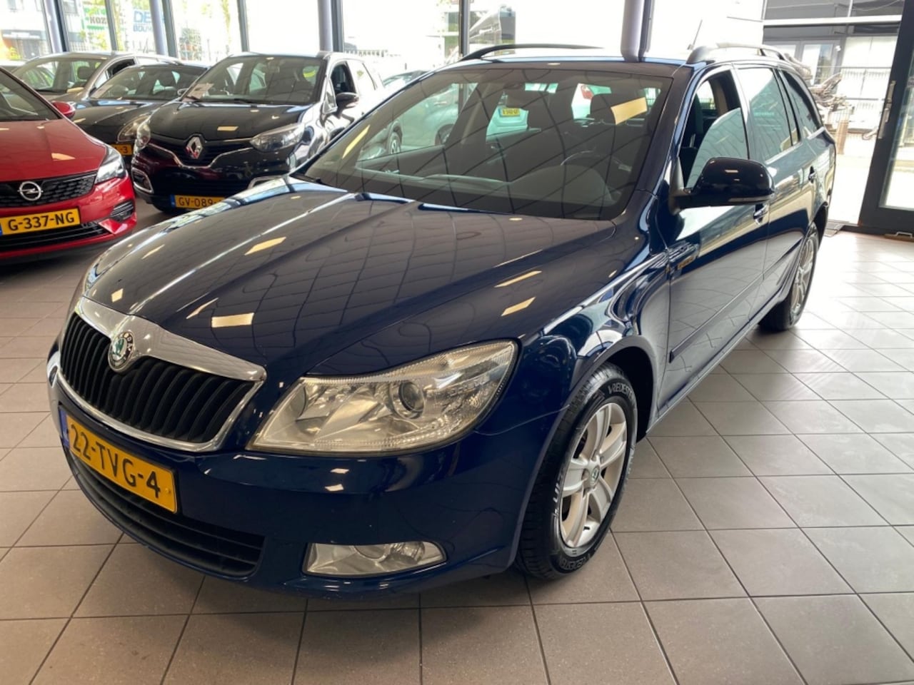 Skoda Octavia Combi - 1.2 TSI Ambition Bns NAVI AUTOMAAT BJ 2012 !!! - AutoWereld.nl