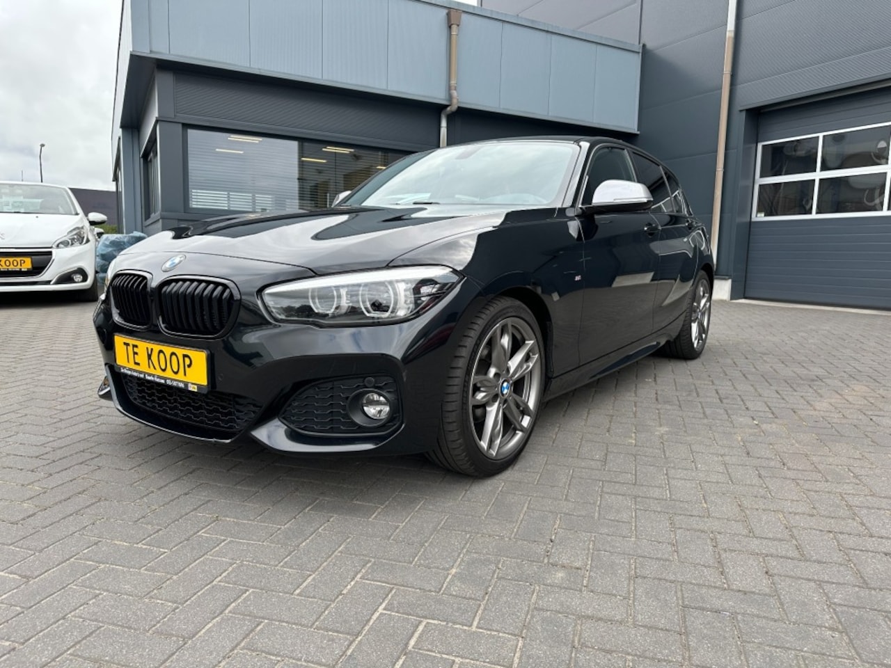 BMW 1-serie - 116i Edition M-Sport Shadow High Executive Trekhaak - AutoWereld.nl