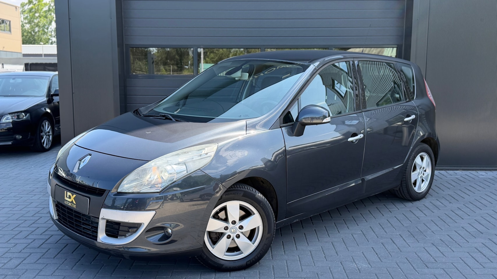 Renault Scénic - 2.0 Dynamique|Keyless|PDC|Airco|Cruise|Navi - AutoWereld.nl