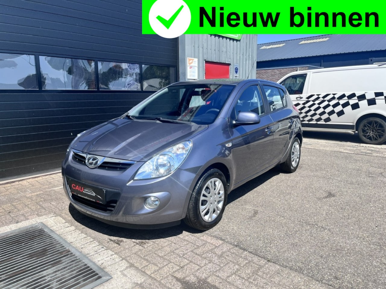 Hyundai i20 - 1.4i Dynamic Dealer ondh|Airco|Uniek - AutoWereld.nl
