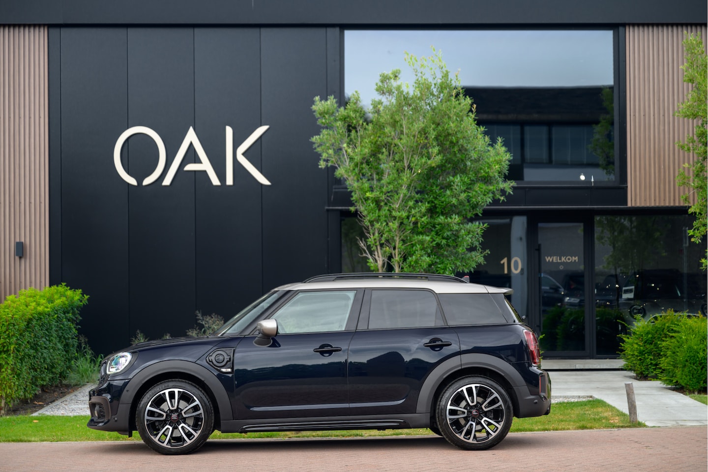 MINI Countryman - 1.5 Cooper SE Hybrid ALL4 | JCW-Trim | Navi | Panorama | Leder Chester | Memory | H&K | He - AutoWereld.nl