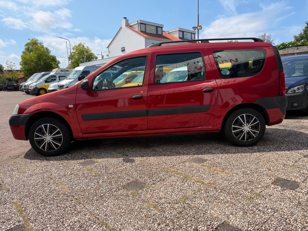 Dacia Logan MCV - 1.6-16V,Lauréate,AC,7-PERSOONS - AutoWereld.nl