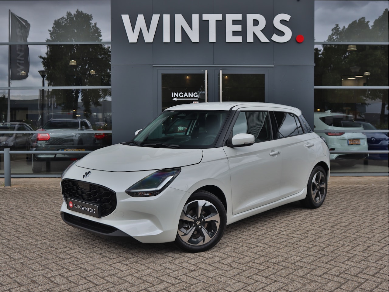 Suzuki Swift - 1.2 Style Smart Hybrid CVT Automaat Navigatie | Camera | Stoelverwarming | LED | Keyless - AutoWereld.nl