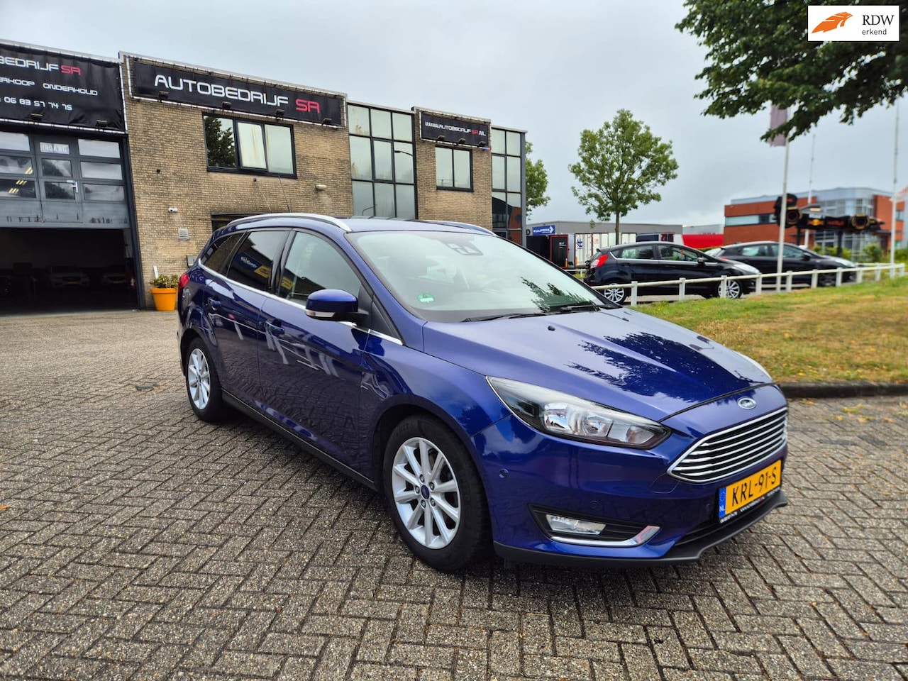 Ford Focus - Ecoboost Titanium Nieuwe Distributie PDC Navigatie! Elektr Pakket - AutoWereld.nl