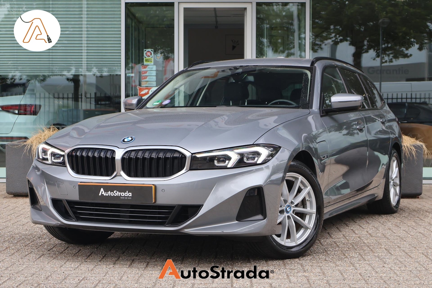 BMW 3-serie Touring - (g21) 320e High Executive 204pk | Leder | Memory | Camera | LED | Stoelverwarming | Trekha - AutoWereld.nl