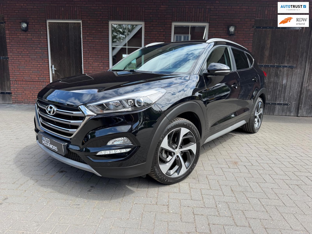 Hyundai Tucson - 1.6 T-GDI Premium| Automaat| Camera| Leder - AutoWereld.nl