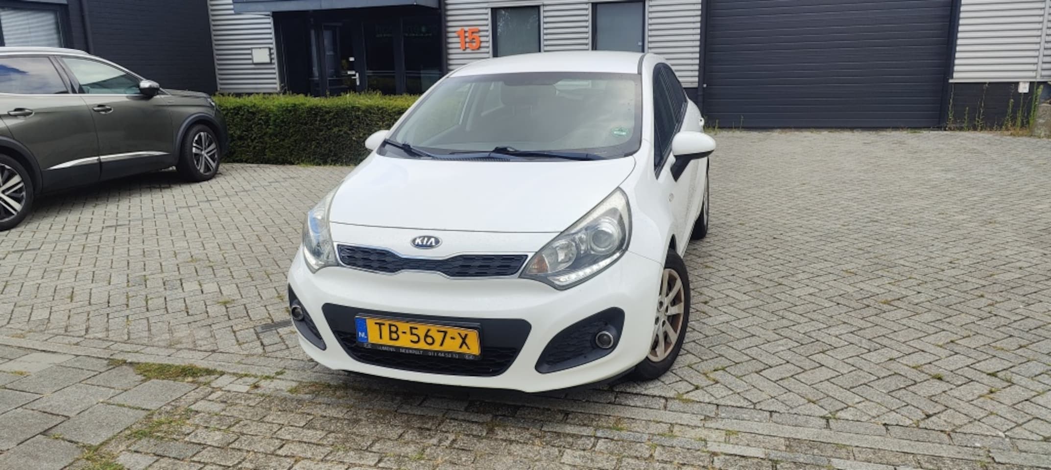 Kia Rio - 1.2 CVVT Comf. Pack 2013 Clima Navi - AutoWereld.nl