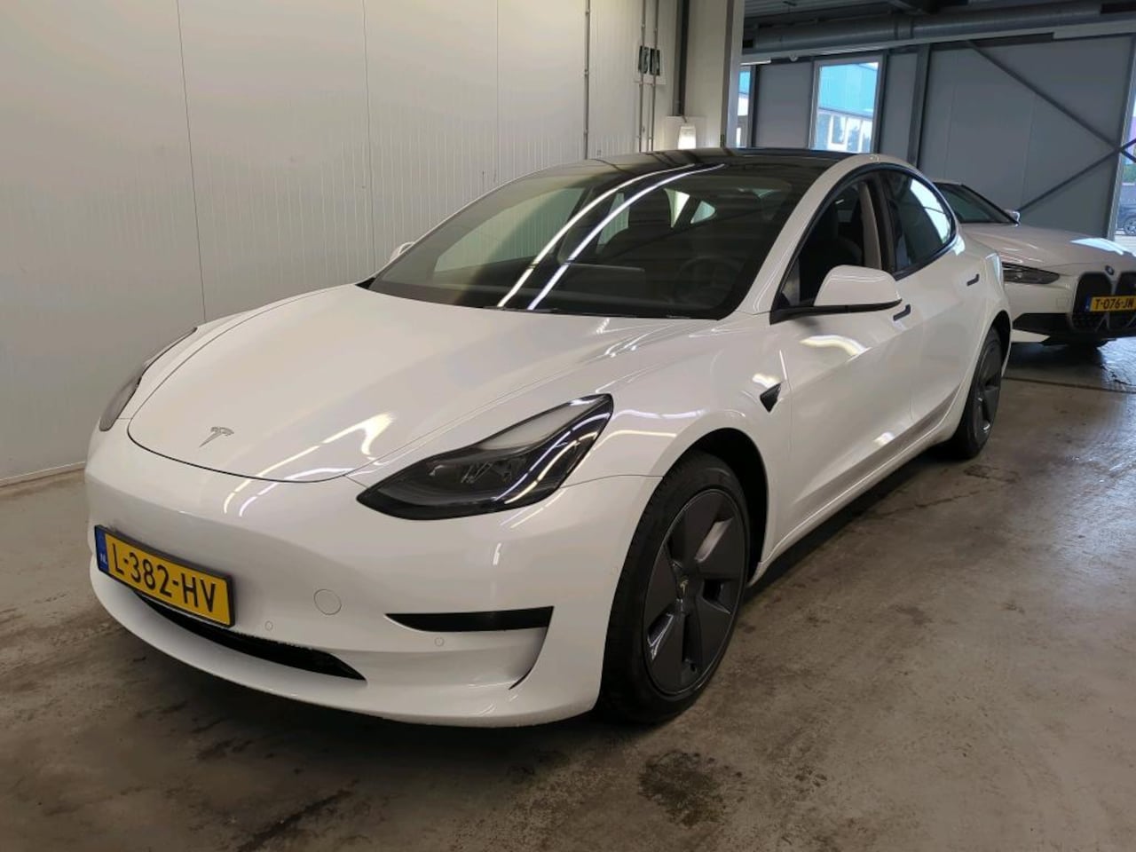 Tesla Model 3 - Standard RWD Plus FACELIFT 90,3% SoH [ LFP-ACCU+WARMTEPOMP+AUTOPILOT+60 kWh+PREMIUM AUDIO - AutoWereld.nl