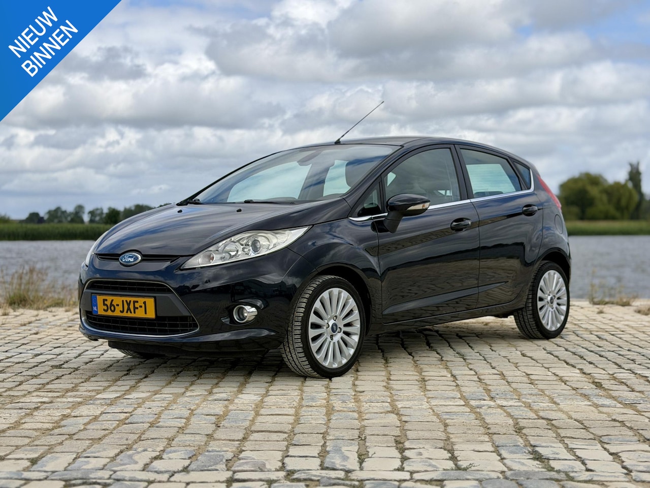 Ford Fiesta - 1.25 Titanium|Trekhaak|Cruise|PDC|Airco - AutoWereld.nl