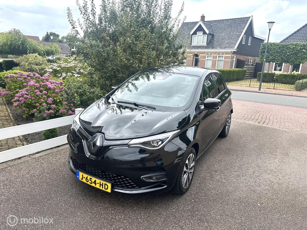 Renault Zoe - R135 Edition One 52 kWh KOOPACCU WARMTEPOMP CAMERA NAVIGATIE BOSE AUDIO BLINDSPOT ZEER LUX - AutoWereld.nl