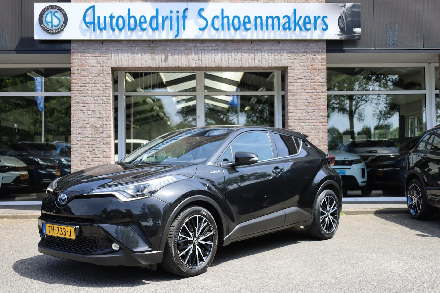 Toyota C-HR - 1.8 Hybrid Bi-Tone TREKHAAK LEER STOEL/STUURVERW. CAMERA NAVI ACC CLIMA PDC 18''LMV NAP DE - AutoWereld.nl