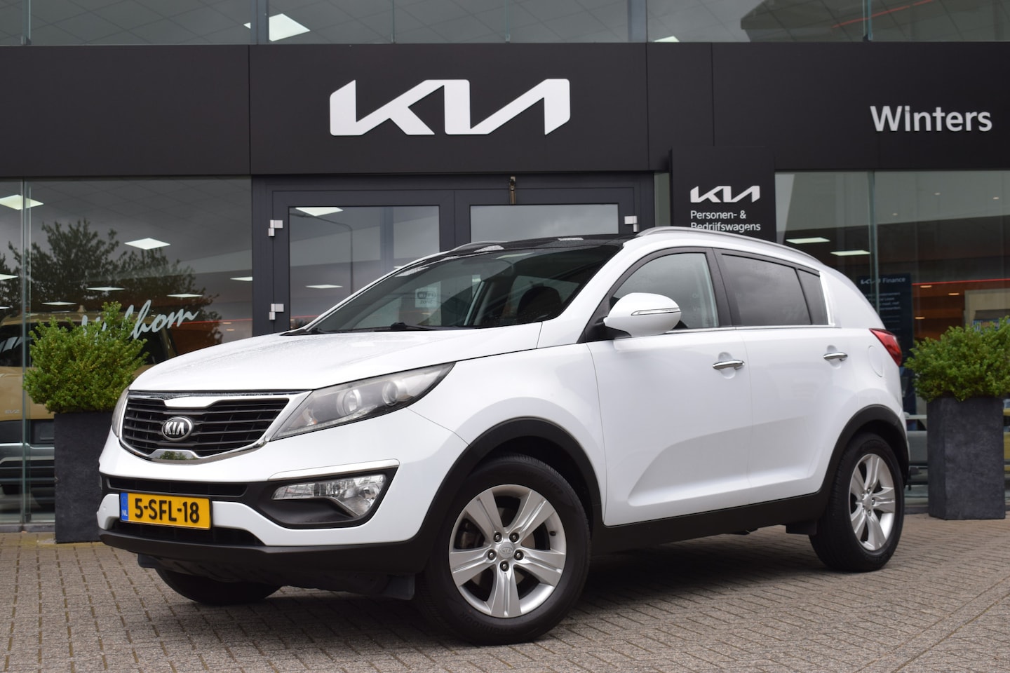 Kia Sportage - 1.6 GDI 20th Anniversary | Trekhaak | Kantel-/ Shuifdak | Camera | Navigatie | Climate + C - AutoWereld.nl
