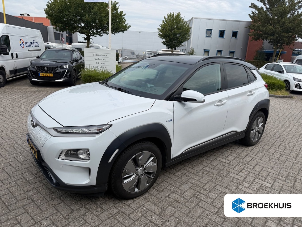 Hyundai Kona Electric - EV Comfort 64 kWh | Head-Up | Apple Carplay/Android Auto | Leder | Adaptive Cruise Control - AutoWereld.nl